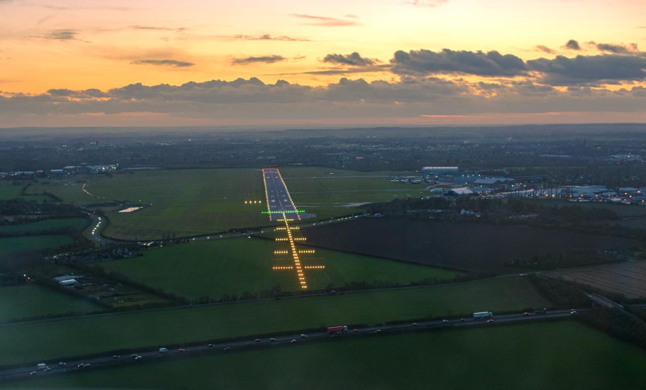 Aerial view of Cambridge Airport at golden hour
